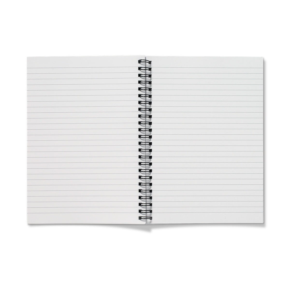 Open spiral-bound Arran Embers notebook with white lined pages and black metal binding for easy note-taking