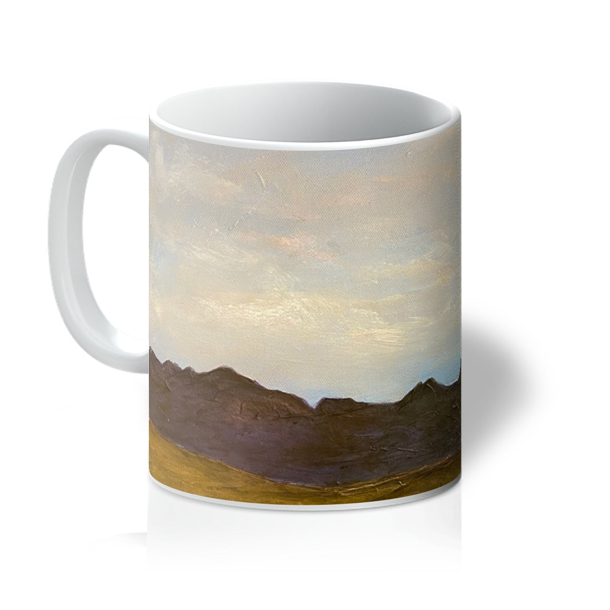 White ceramic The Road To Carbost Mug with painted brown mountains and muted beige-gray sky