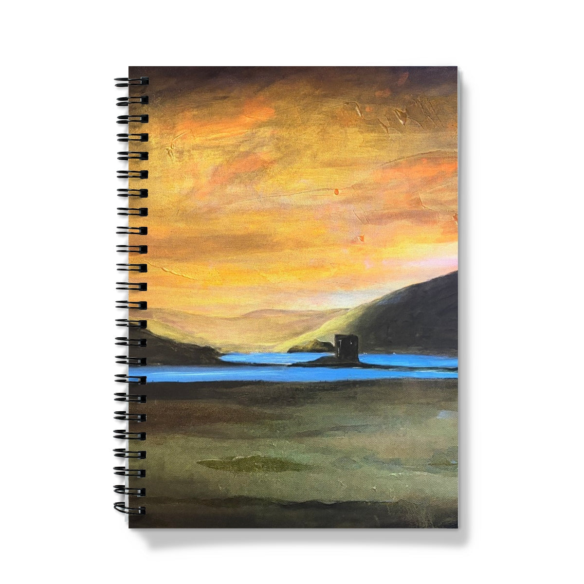 Castle Stalker Glow Notebook with painted orange-yellow sky landscape cover