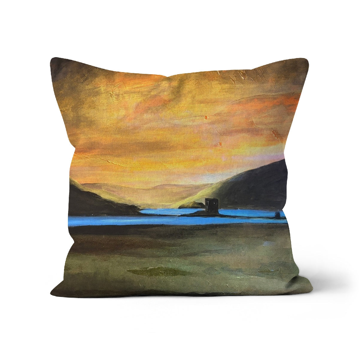 Castle Stalker Glow Cushion with orange-yellow sky over blue water and dark hills