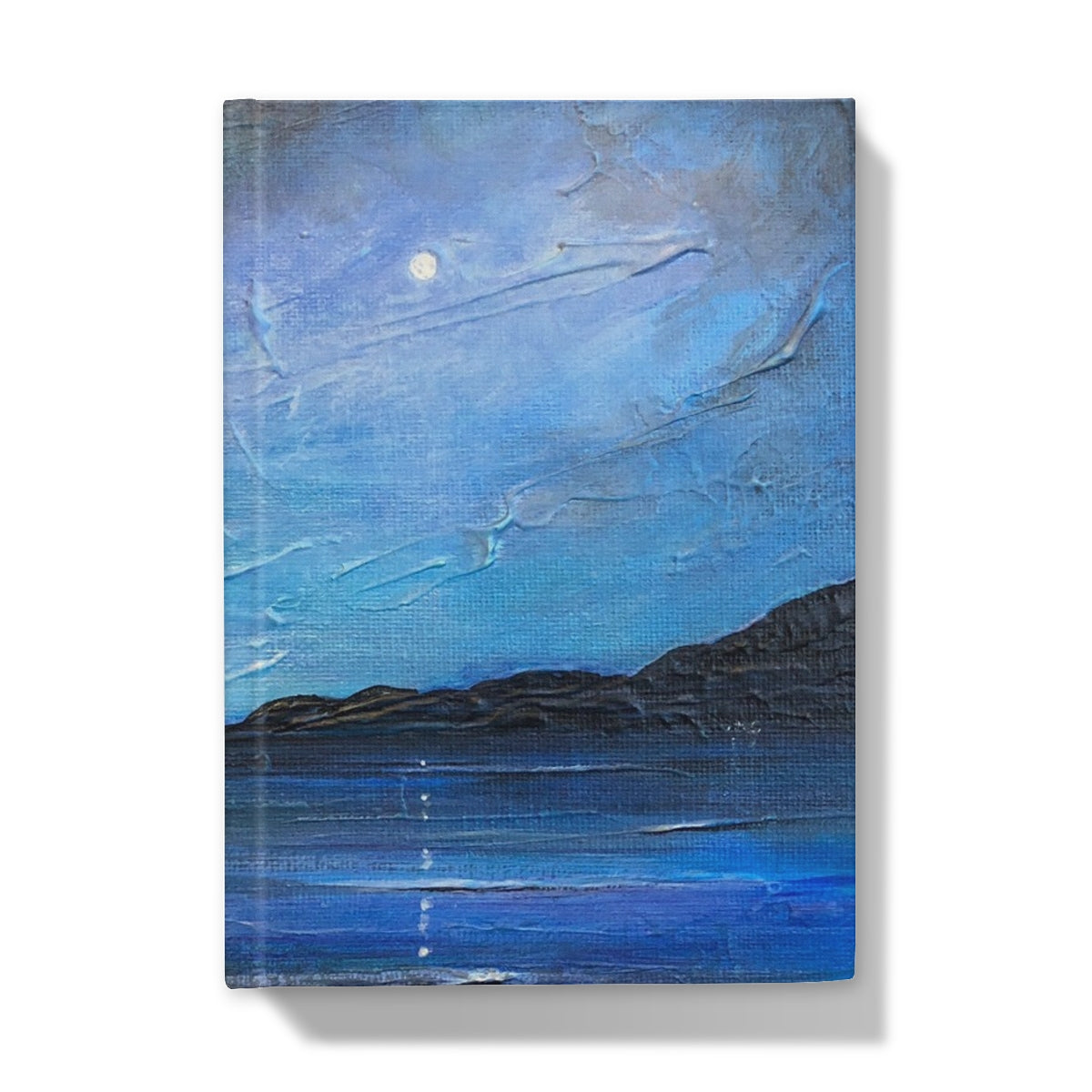Blue textured Loch Ness Moonlight journal with coastal scene