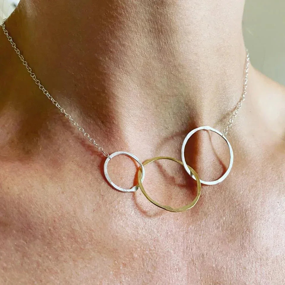 GP Triple Hoop Necklace with three interlocking silver-gold rings on fine chain