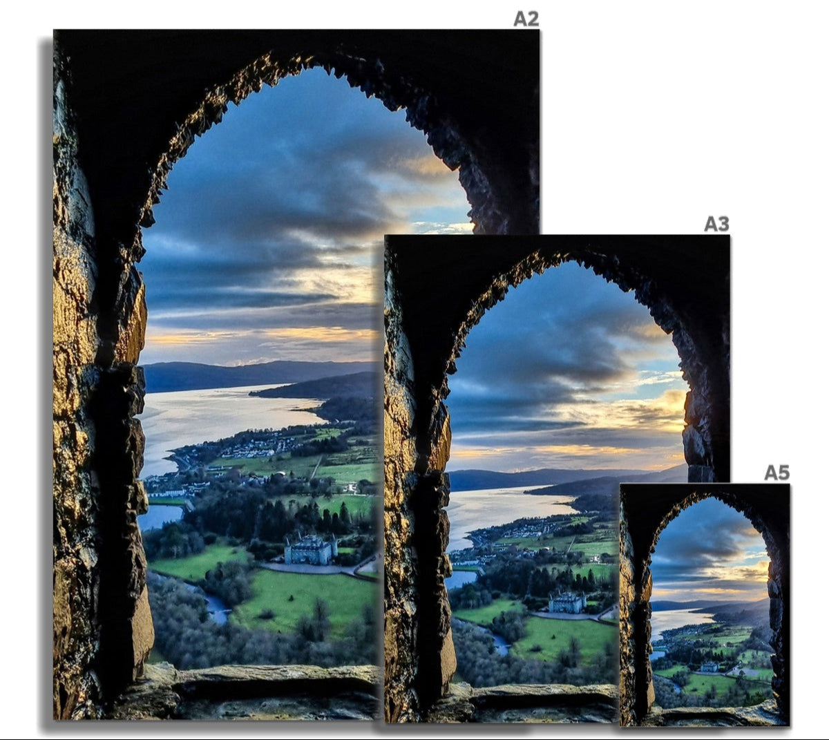 Three framed dun na cuaiche sunset over inveraray fine art prints showing scenic view through arched stone window in sizes a2 a3 and a5