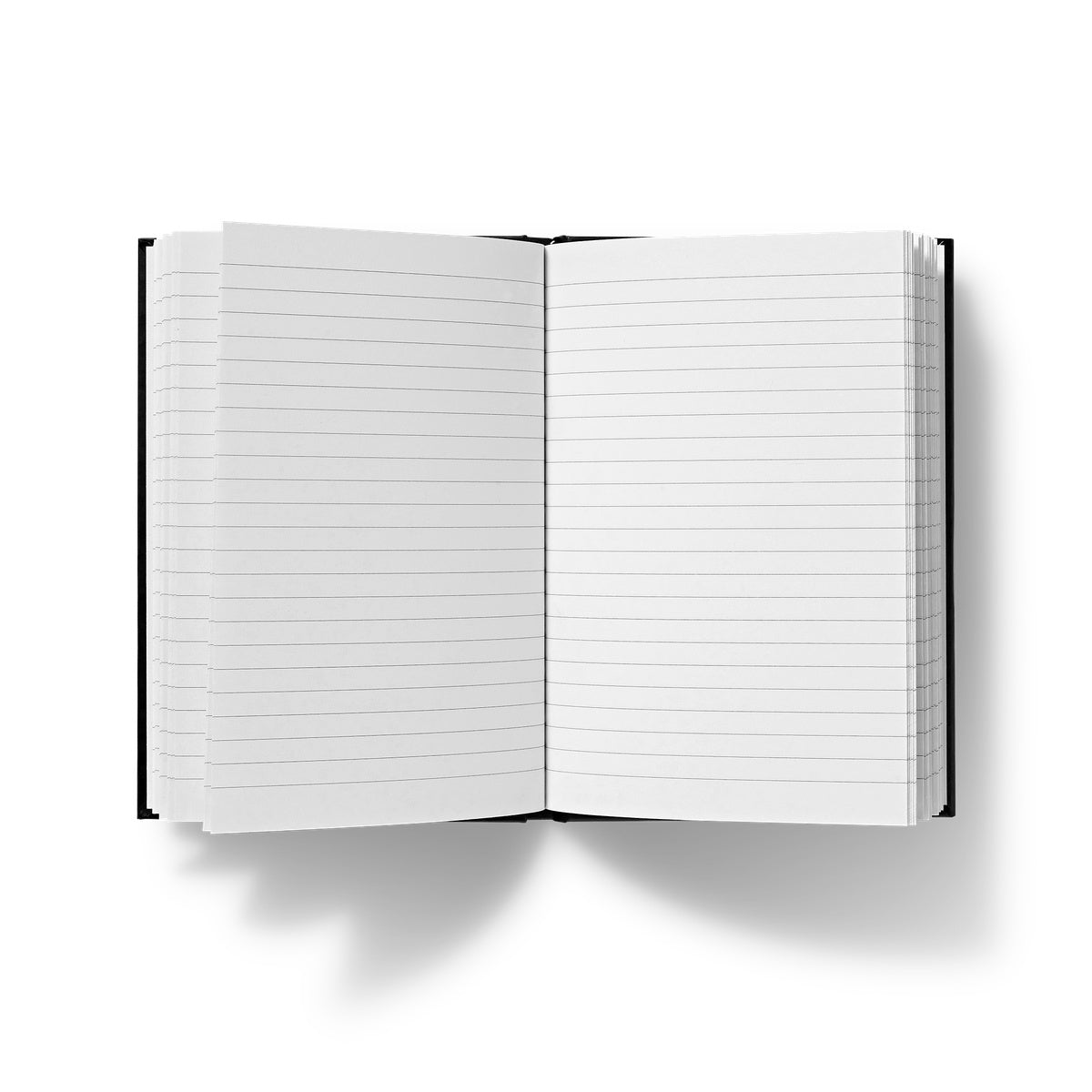 Open black Arran Embers hardback journal with lined white pages for writing and note-taking