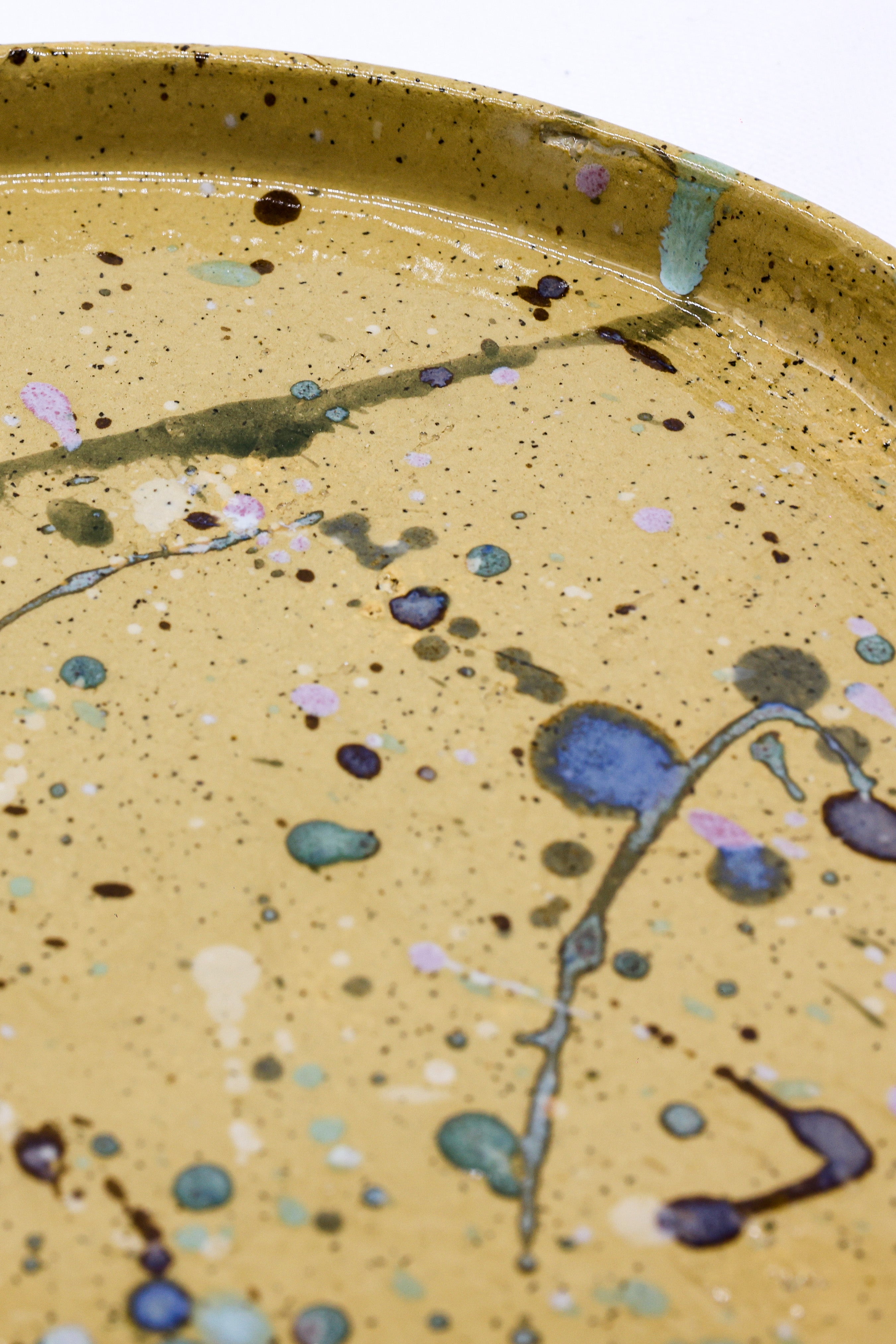 Yellow ceramic dinner plate with speckled glaze and blue purple green splashes handmade 23 cm oliva stoneware