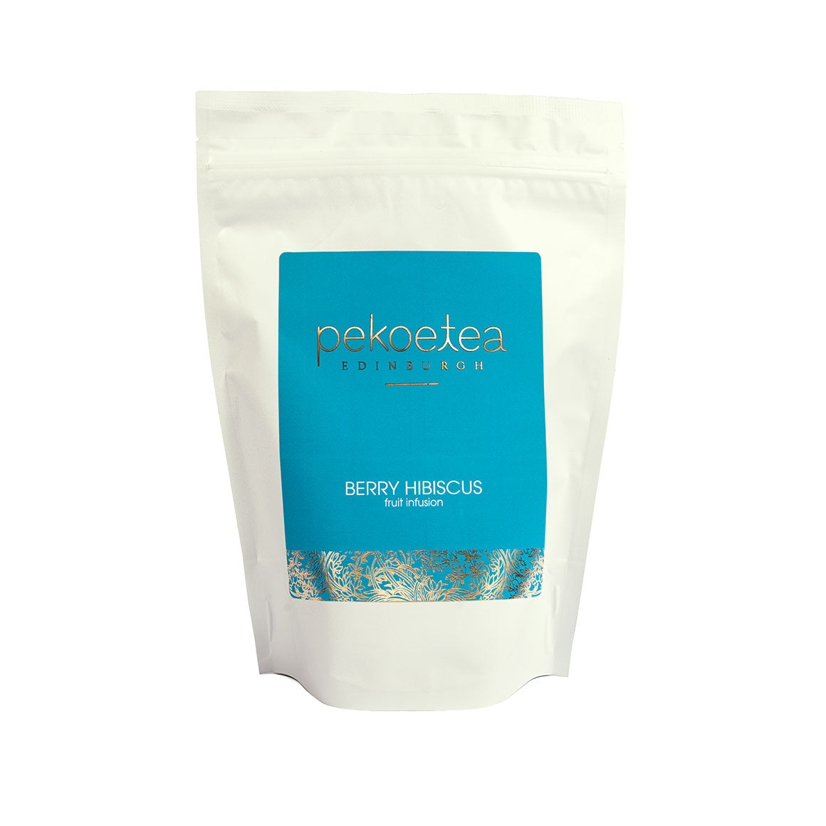 A white resealable pouch of pekotea berry hibiscus fruit infusion with a vibrant blue label and gold foil detailing