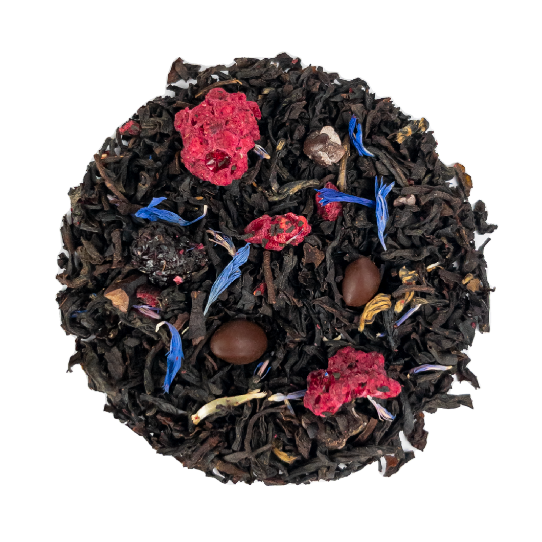 Black forest gateau tea blend with dark black leaves, red rose petals, blue cornflower petals, and brown chocolate pieces