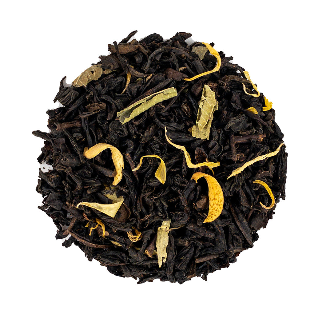 Duchess Grey tea: dark curly black leaves with yellow citrus peel and green fragments
