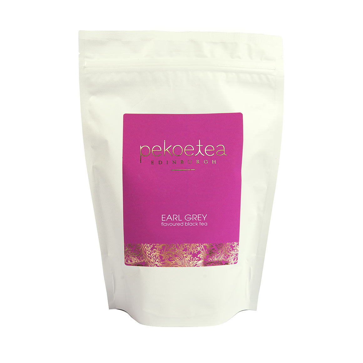 A vibrant pink label on a white resealable pouch of pekoe tea earl grey black tea with blue flower flavor