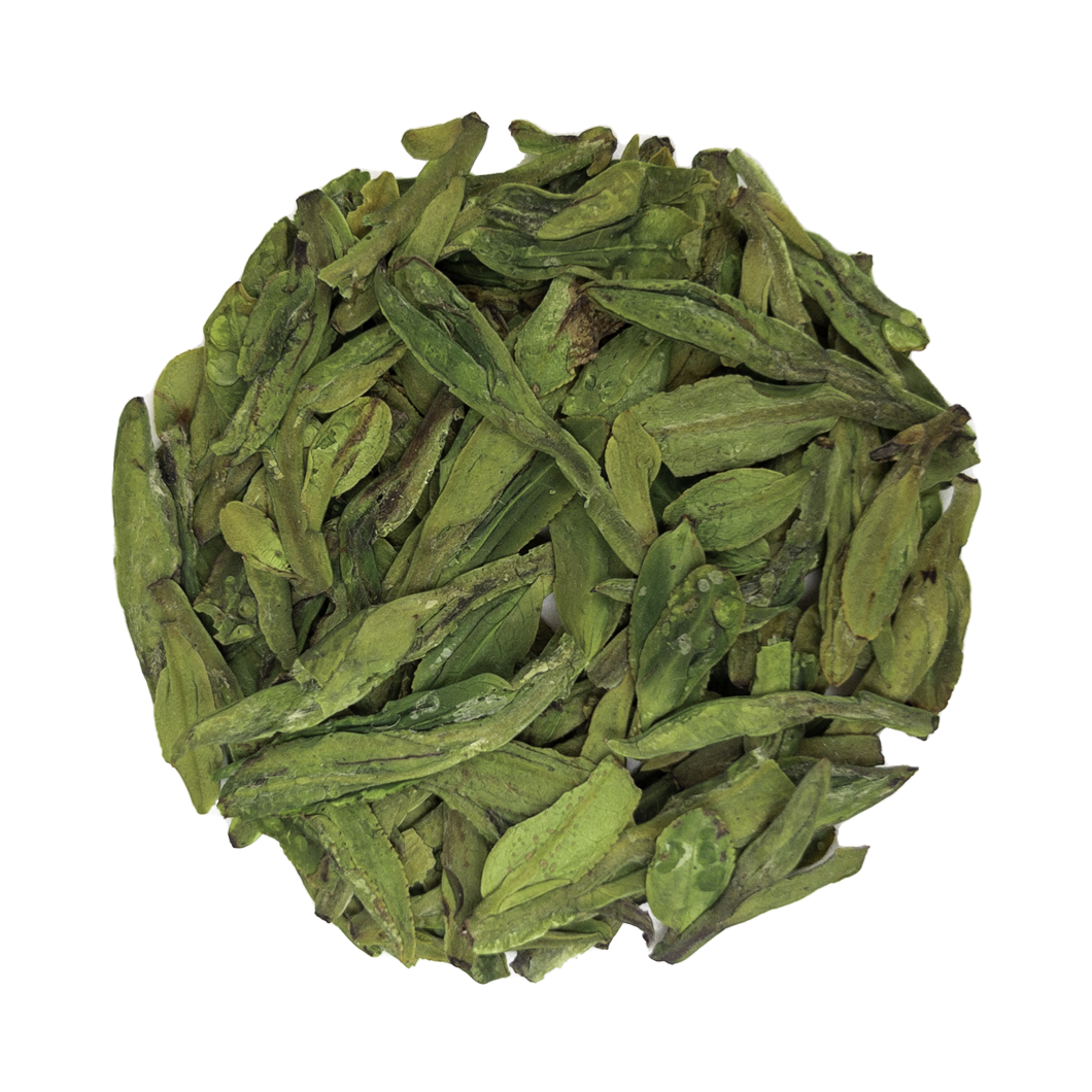 A pile of vibrant slender green pre-rain long jing dragon well tea leaves with a slightly glossy finish