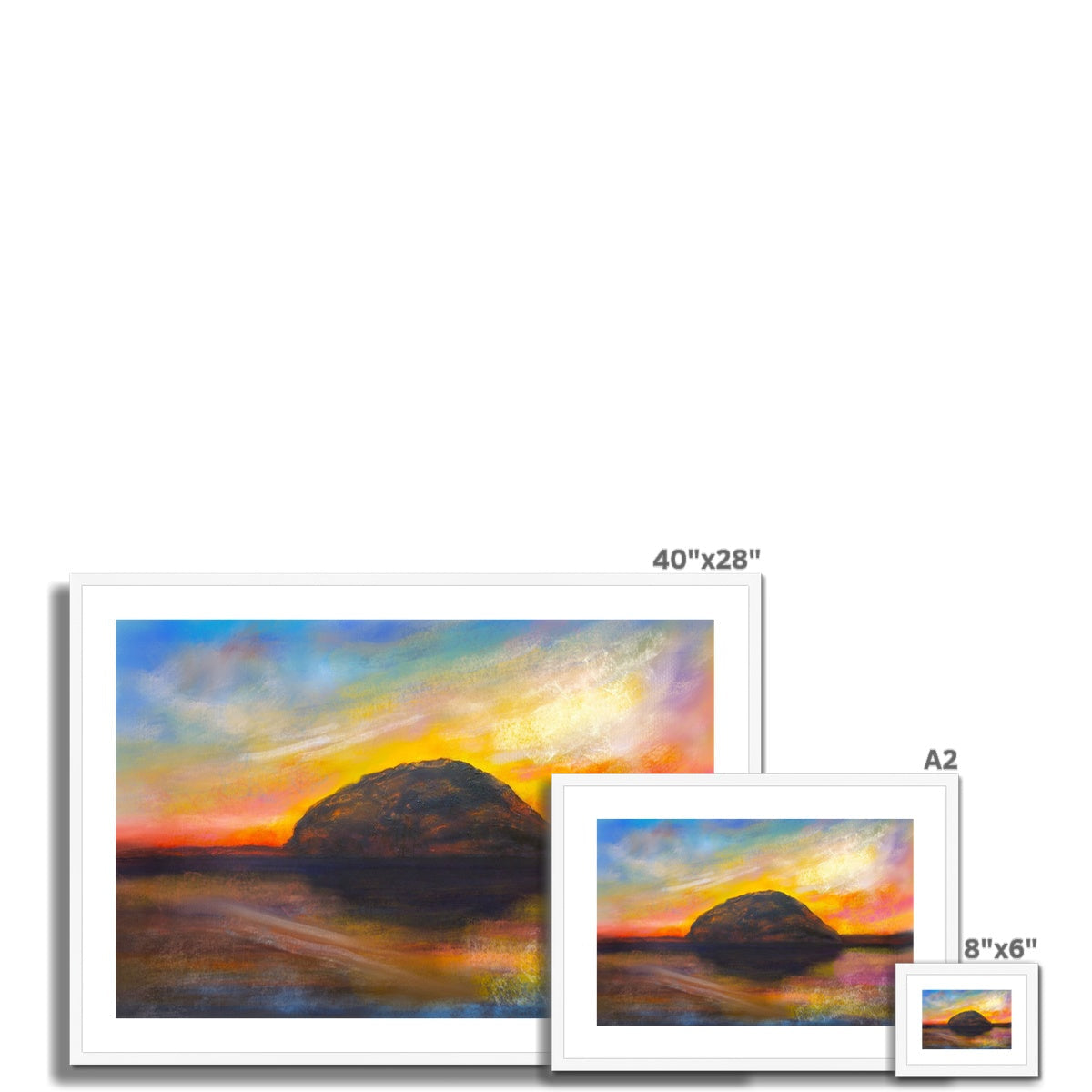 Three framed prints of a colorful sunset landscape in the Ailsa Craig Dusk product display
