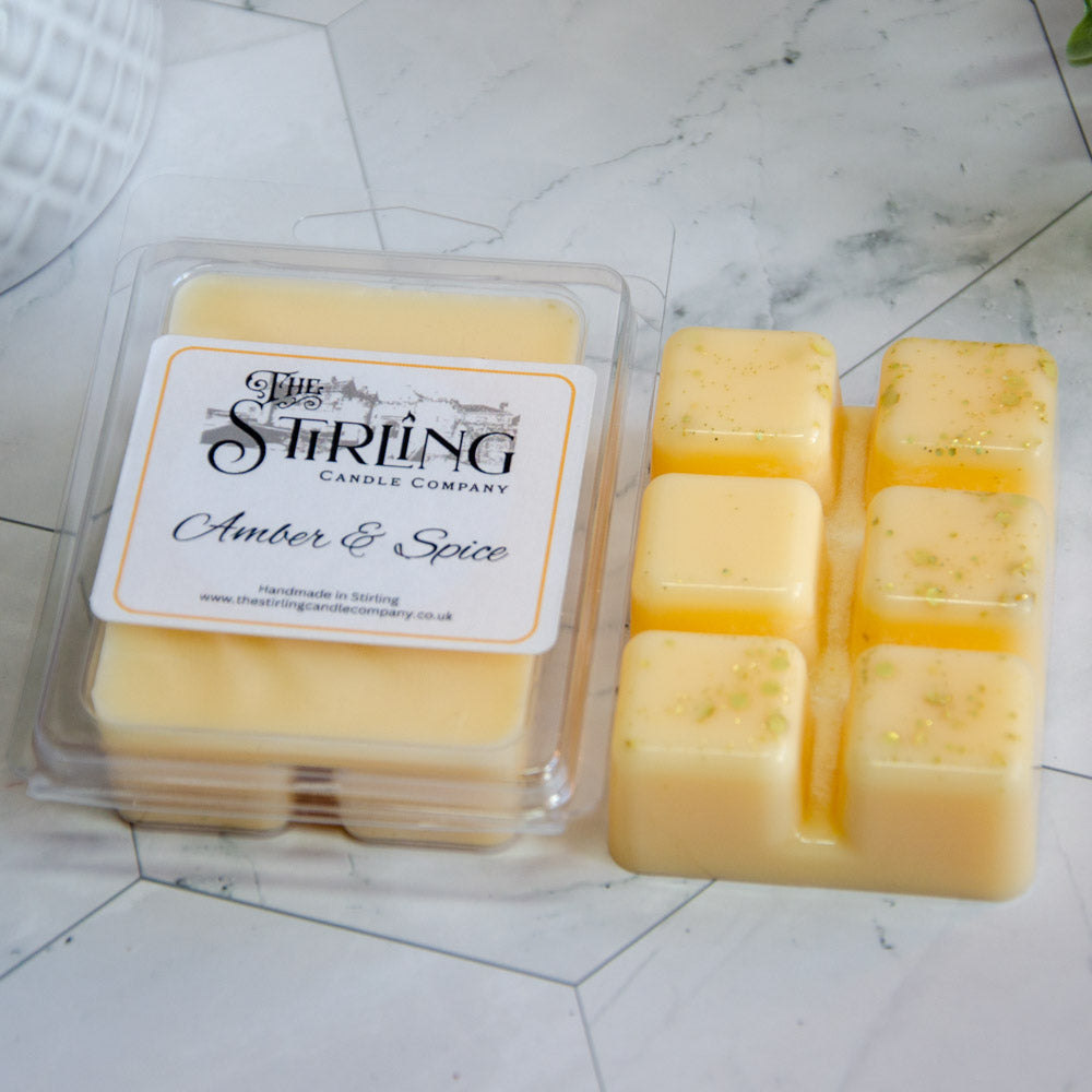 Amber & Spice yellow wax melts in clear clamshell by Stirling Candle Company