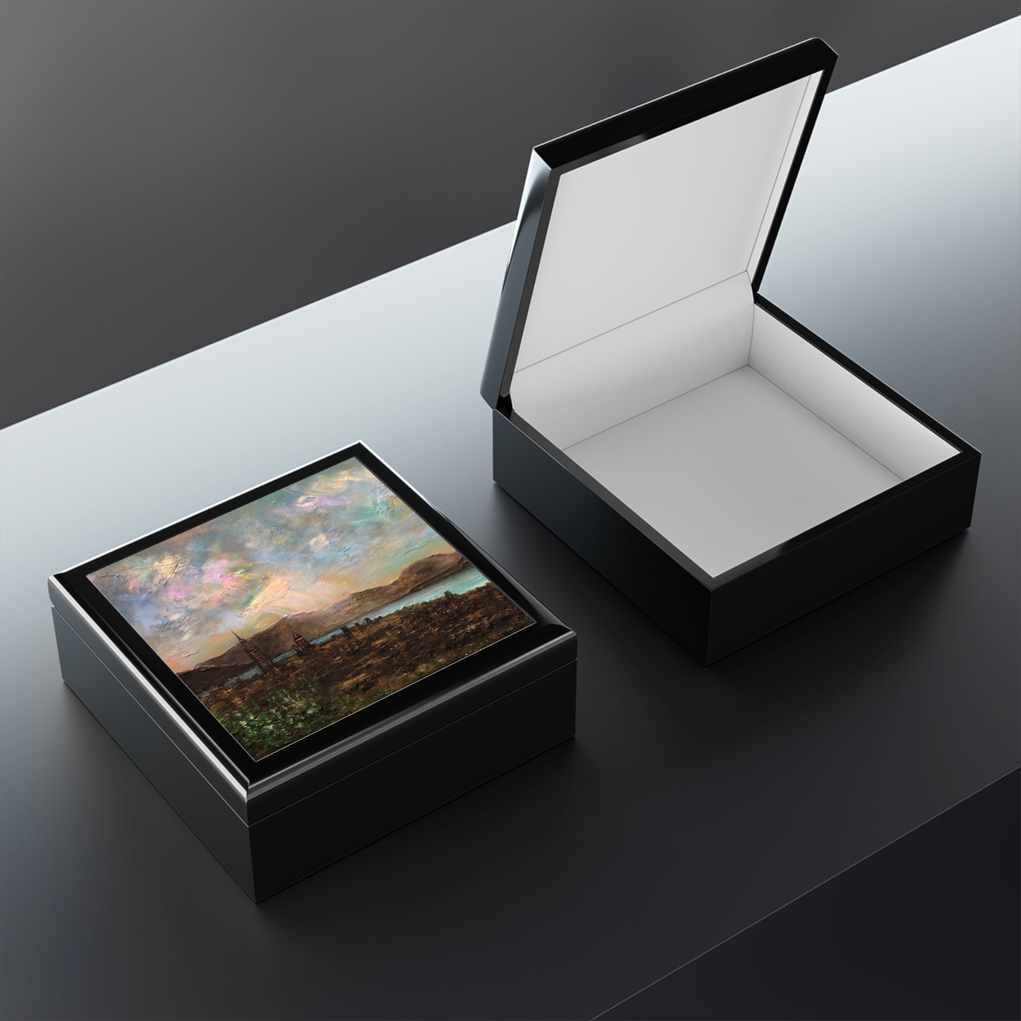 Black lacquered keepsake boxes with landscape art and white interior lining in Scotland