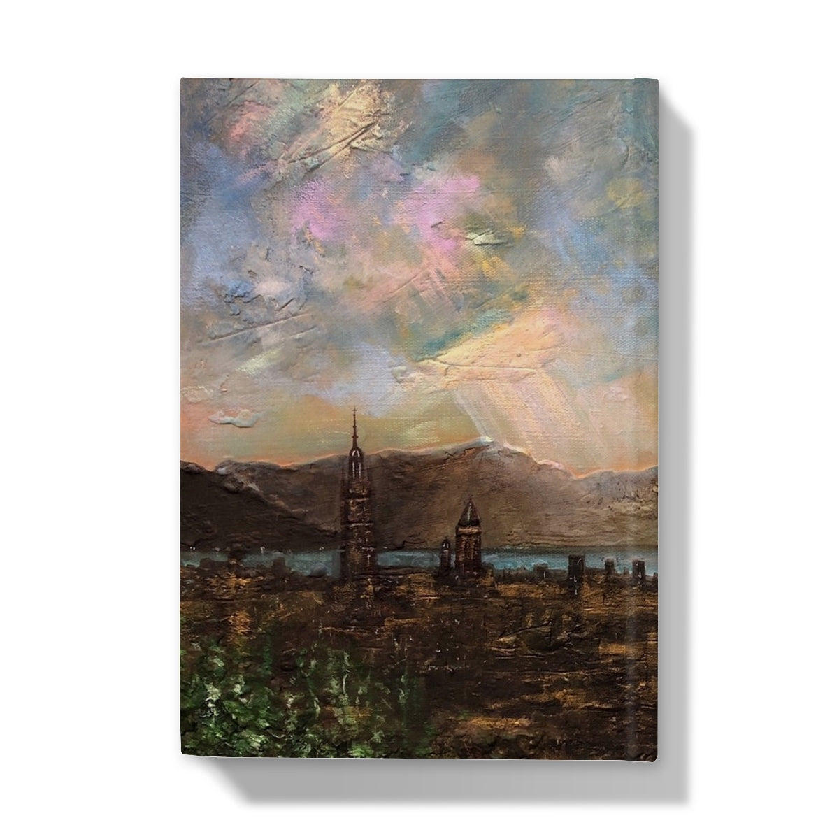 Textured impasto painting of a city landscape with mountains and a lake under a colorful sky for Angels Fingers Over Greenock Hardback Journal