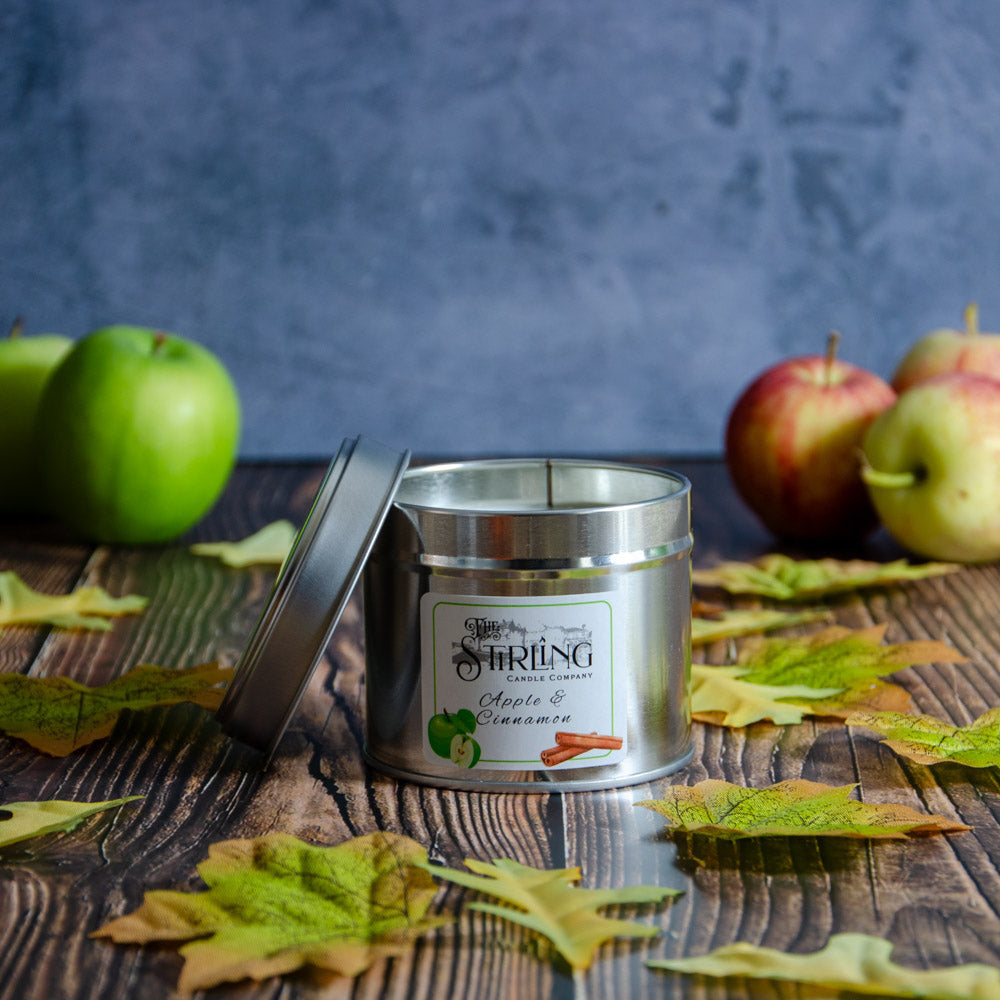 Sleek silver Apple & Cinnamon travel tin candle by Stirring Candle Company
