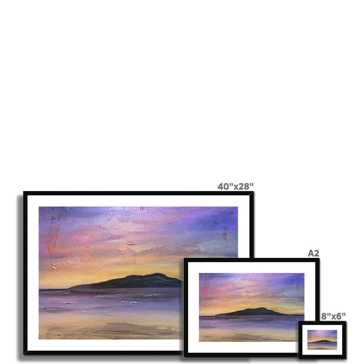 A framed Arran amethyst art print featuring a serene sunset with purple pink and orange sky over a dark island silhouette