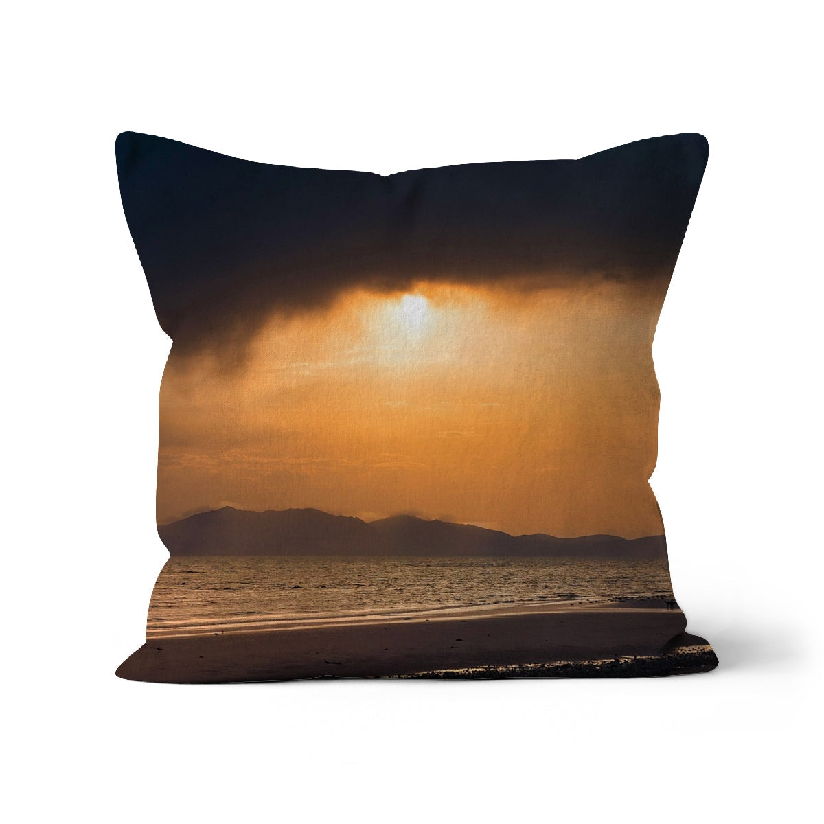 Golden sunset throw pillow with ocean view, dark blue border on black background