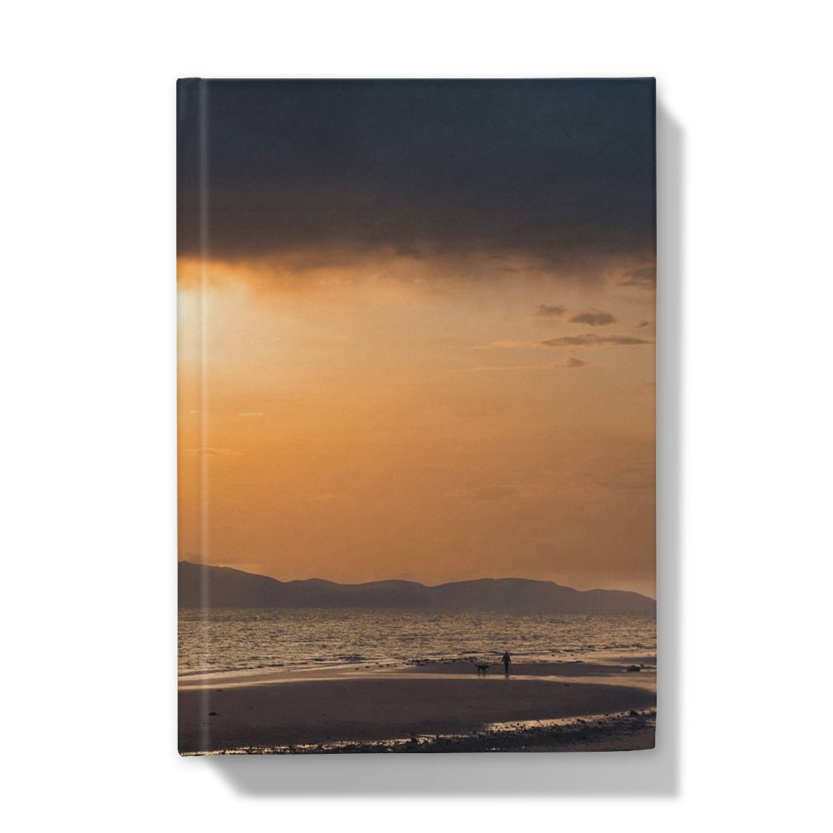 Golden sunset beach with walker on sand, Arran Stormy Sunset journal