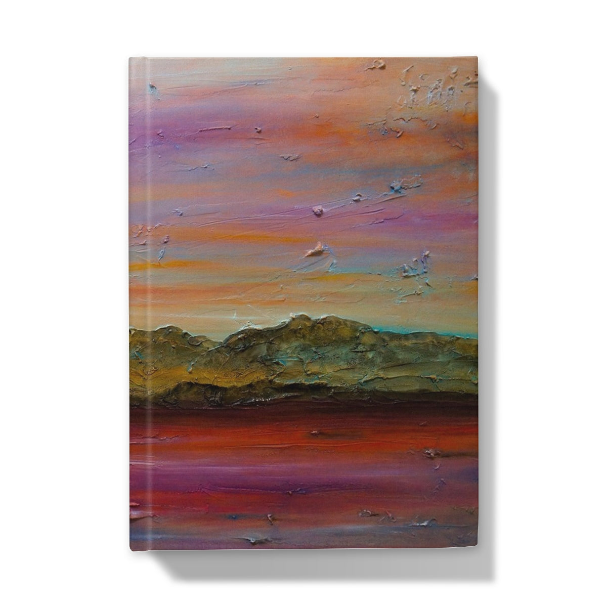 Arran Winter Dusk hardback journal with vibrant purple, orange, green landscape cover