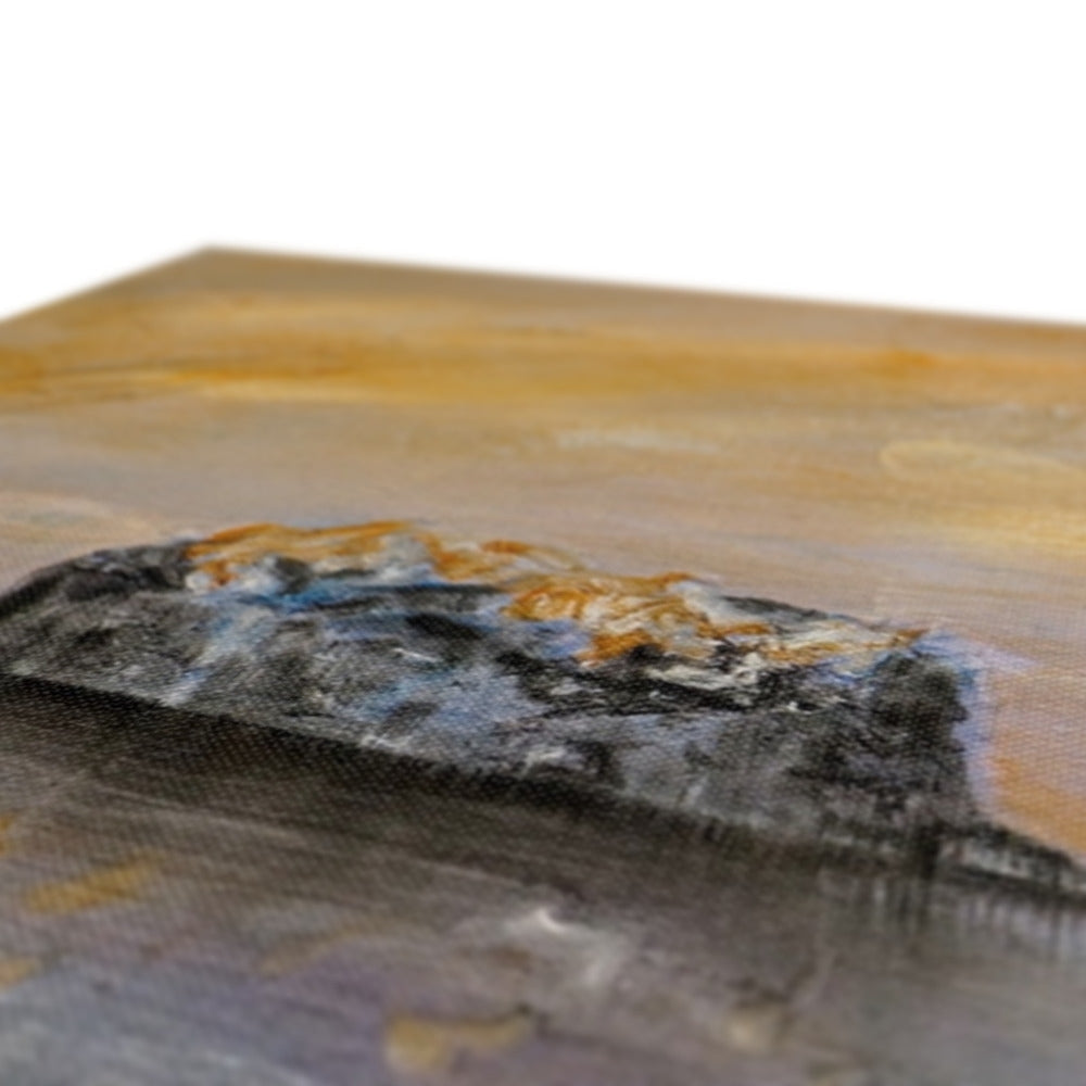 Polished black and orange agate slice coaster on Bass Rock Dawn canvas print