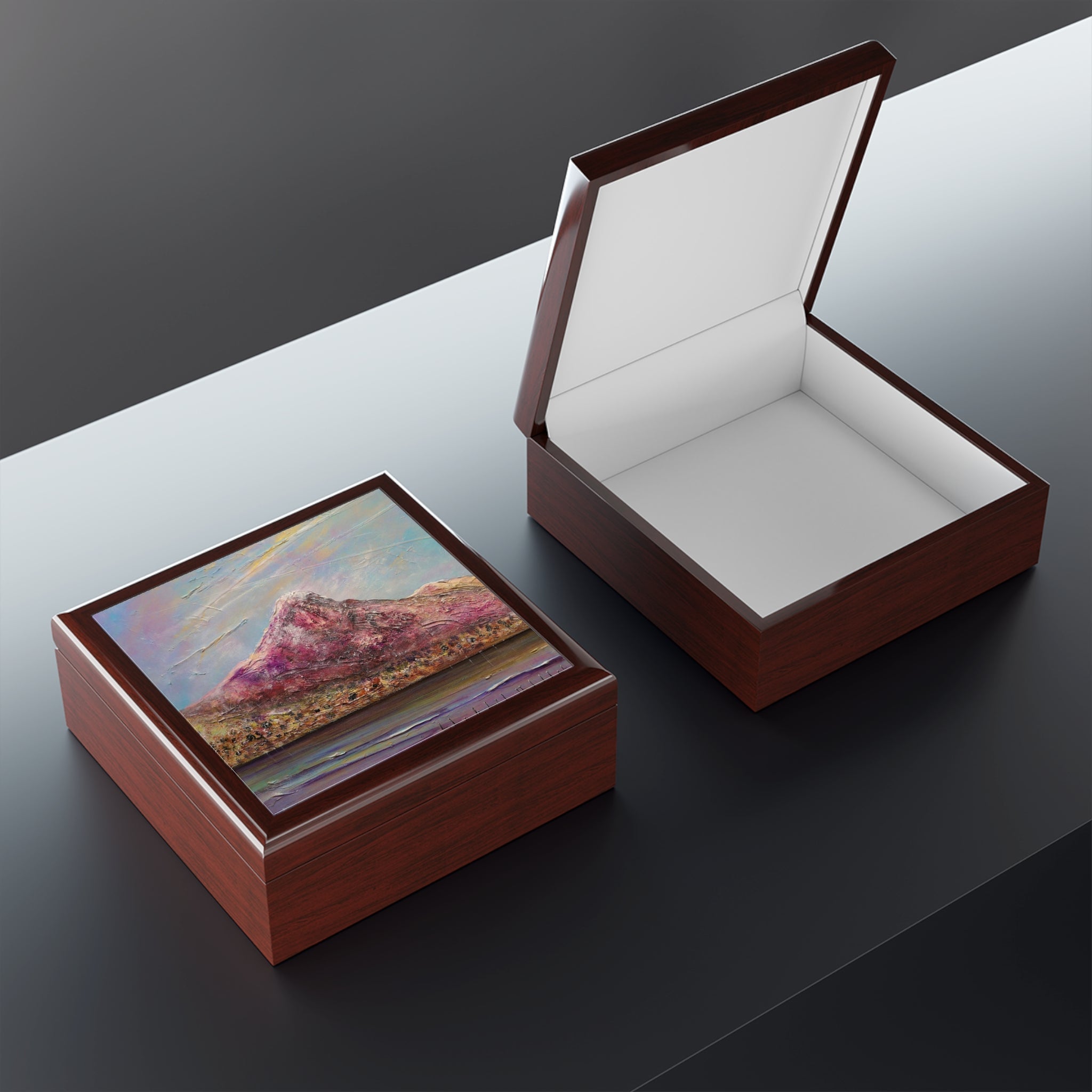 Two brown wooden jewelry boxes one closed with a colorful landscape painting and one open showing a white interior at Ben Lomond Art Jewellery Box Scotland