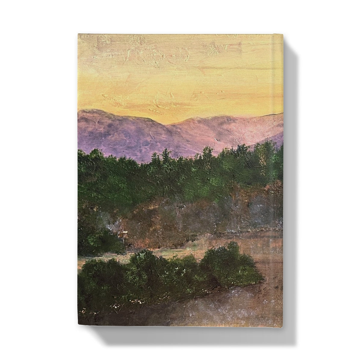 Canvas print of a mountain landscape with green trees purple mountains and orange sky for Ben Tee Invergarry Hardback Journal