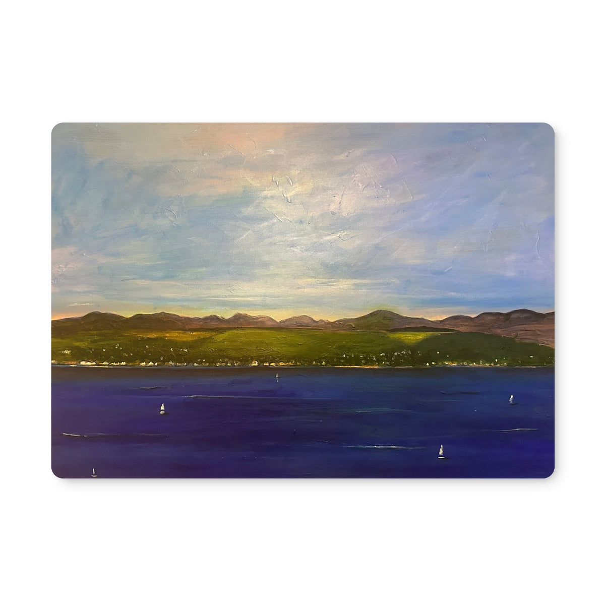 Landscape painting of a tranquil water scene with sailboats, green hills, and a town under clouds for The Biggie Placemat