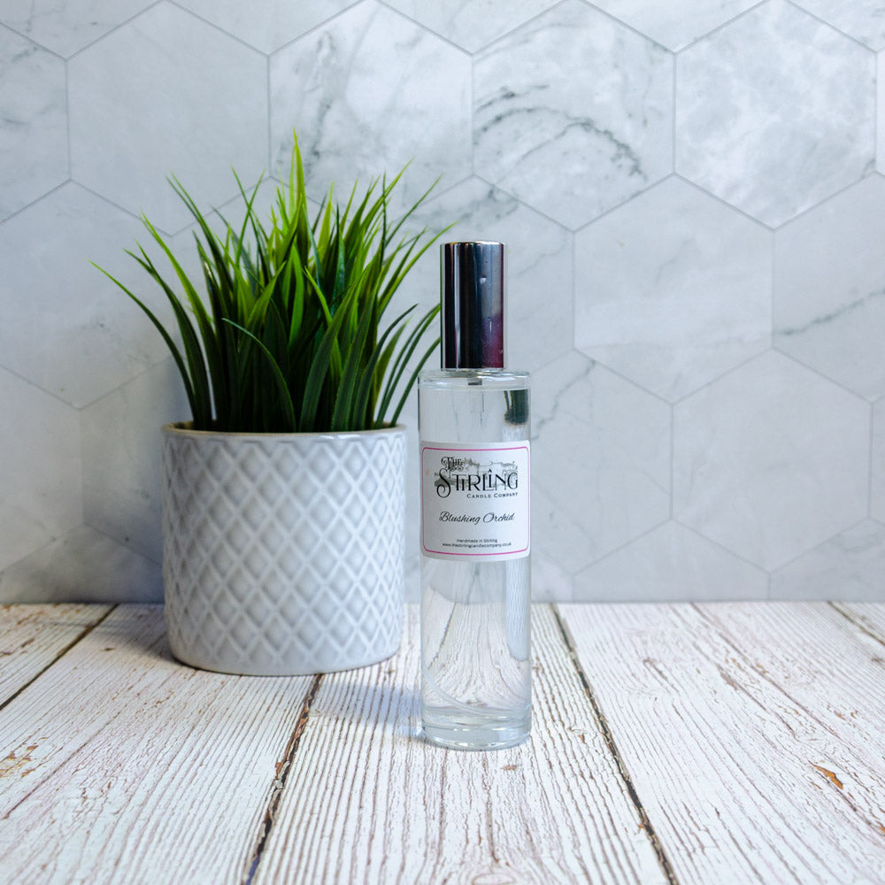 Blushing Orchid room spray in clear glass bottle with silver cap