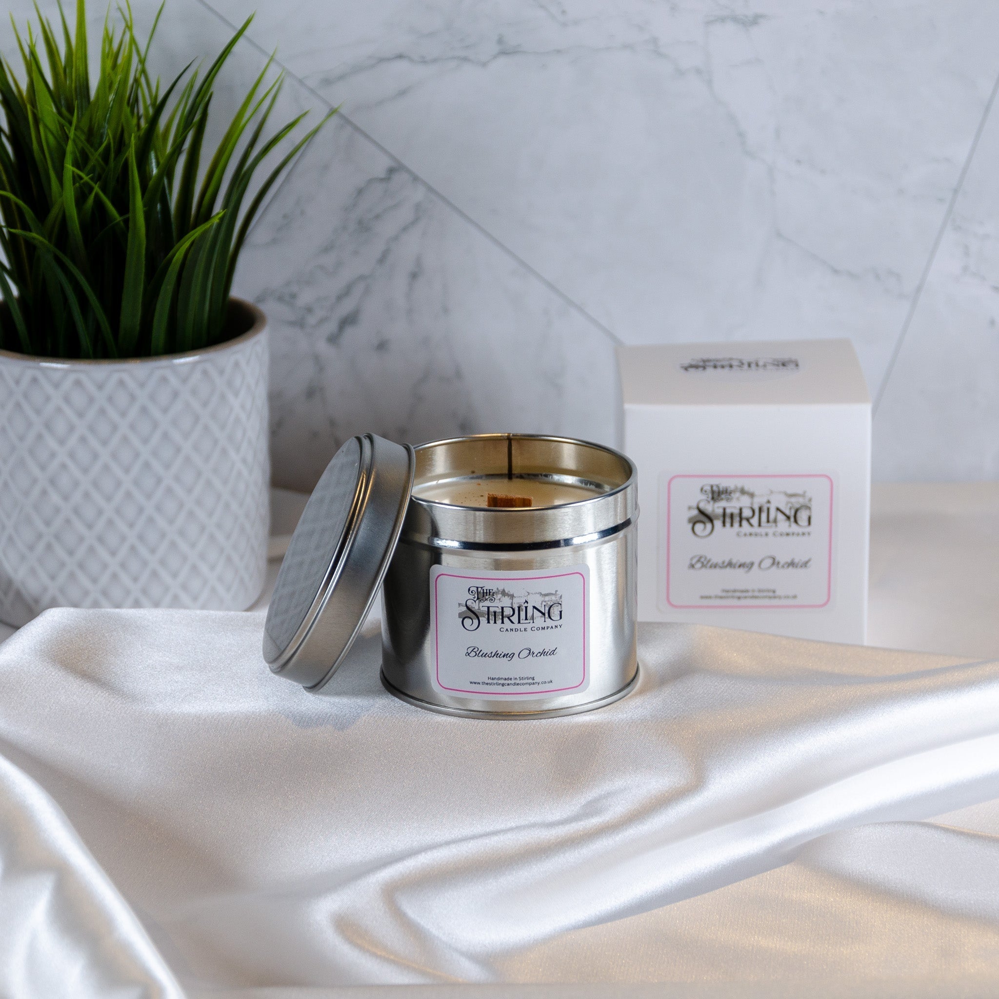 Blushing Orchid travel tin candle by Stirling Candle Company with wooden wick
