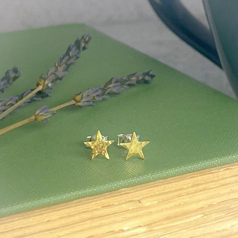 Gold hammered star stud earrings in brass