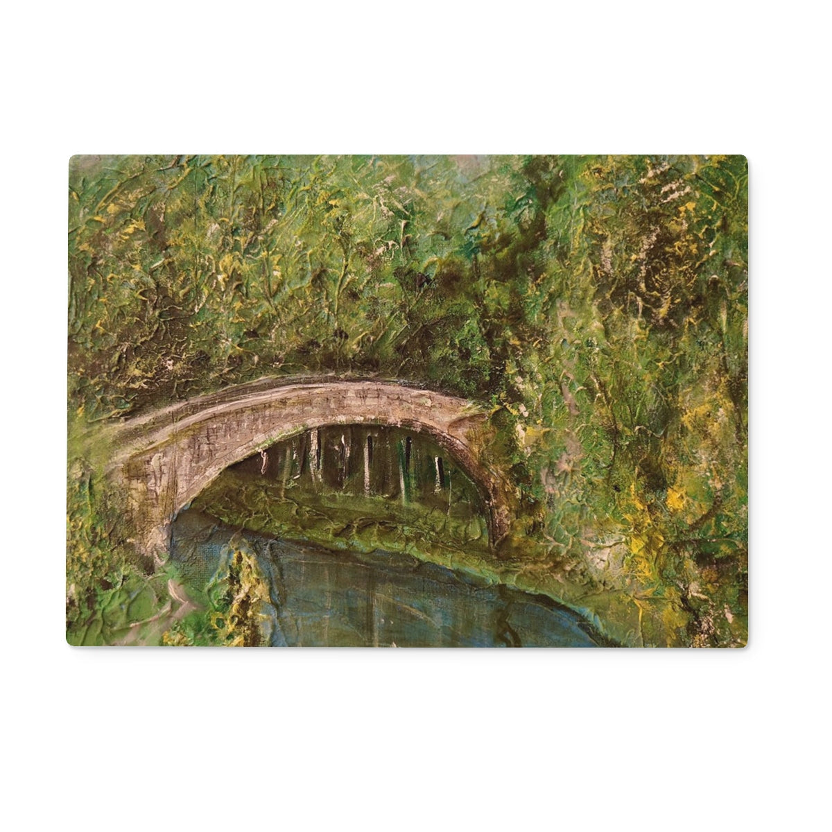 Stone Brig O Doon arch bridge with green foliage and water reflection on glass chopping board