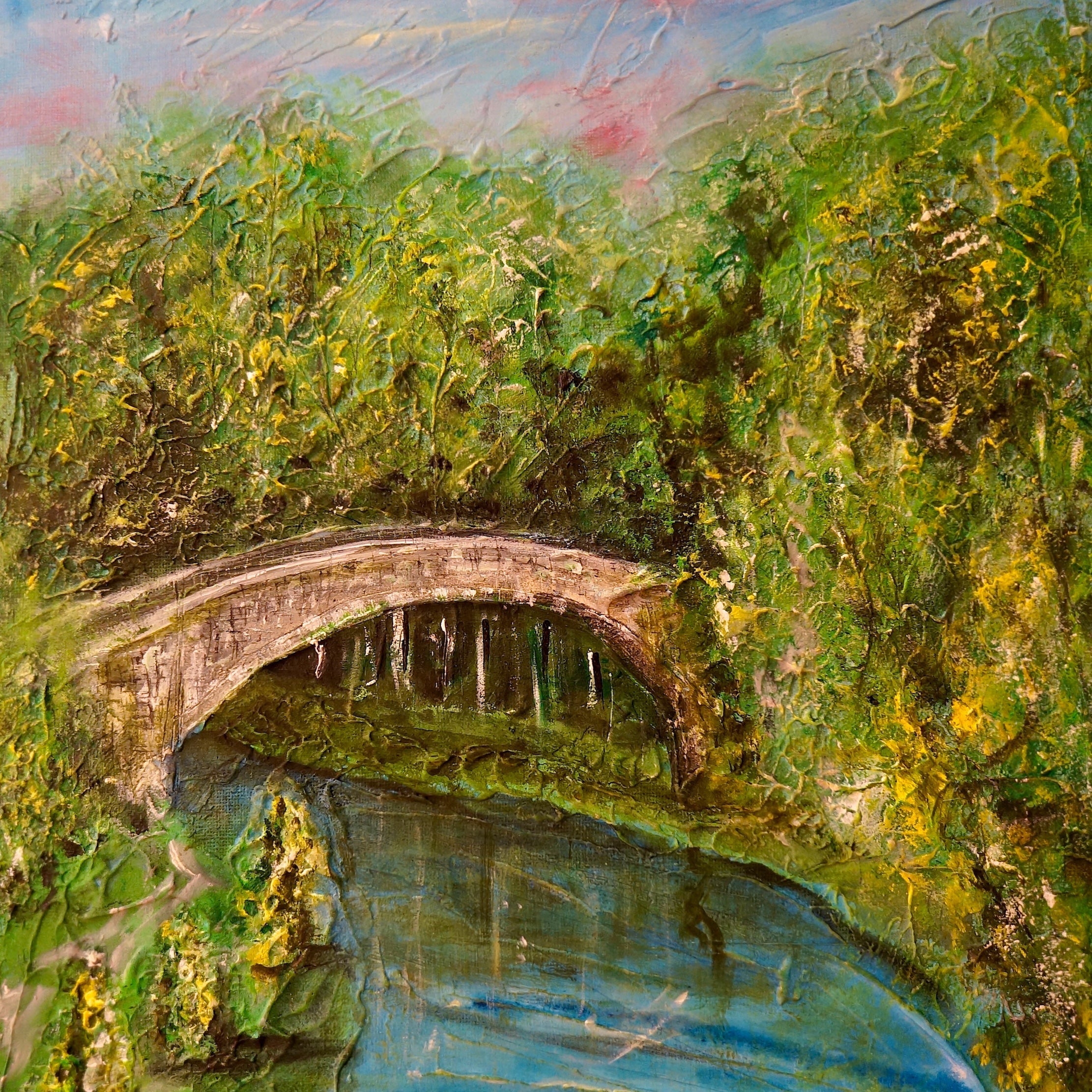 Textured painting of Stone Bridge over a river with lush green trees under a colorful sky
