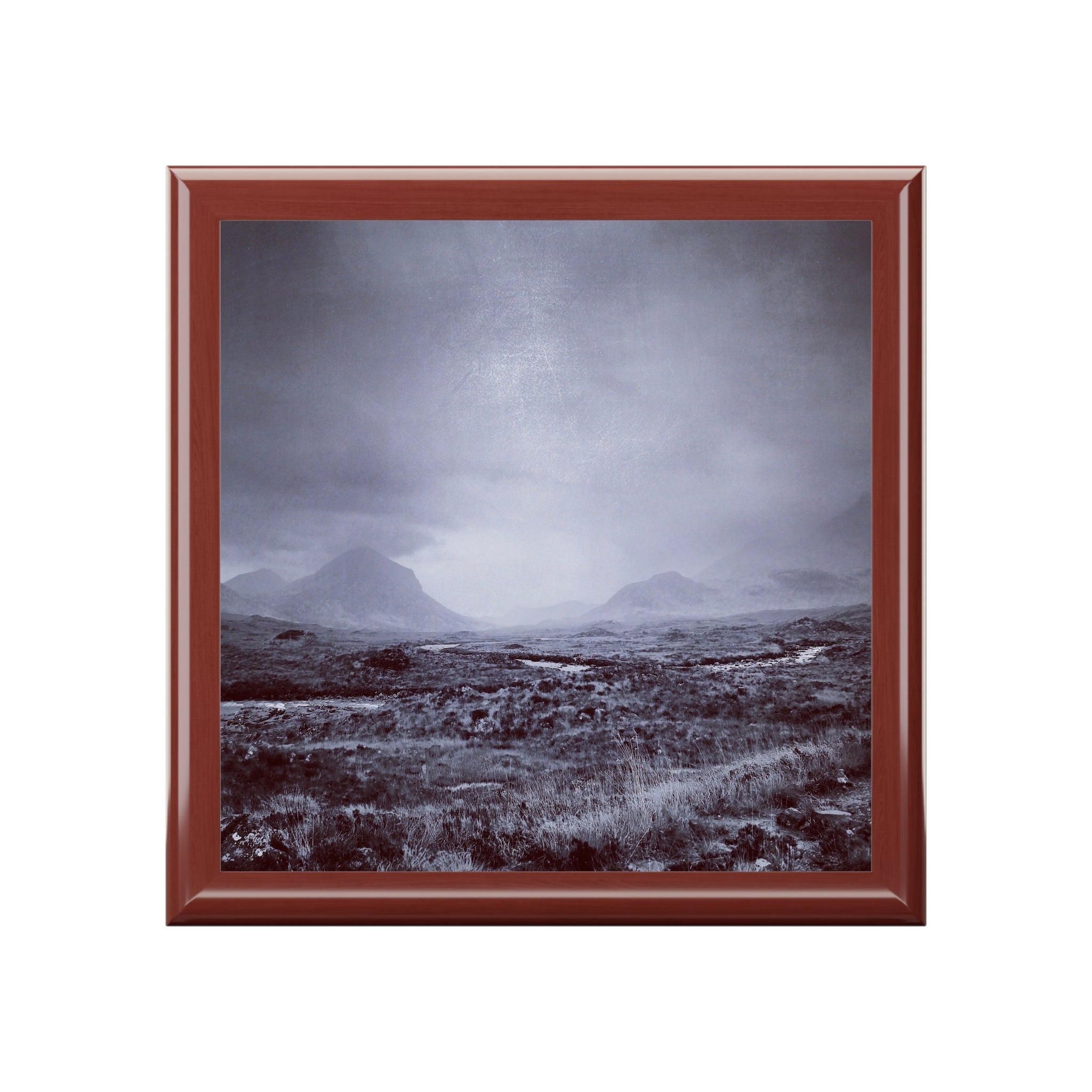 Square-framed photo of misty Brooding Cuillin mountains in Scotland