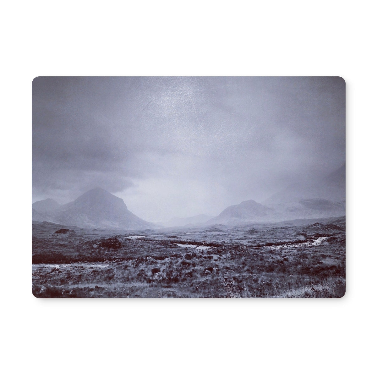 Gray and white snowflake Brooding Cuillin placemat with black border