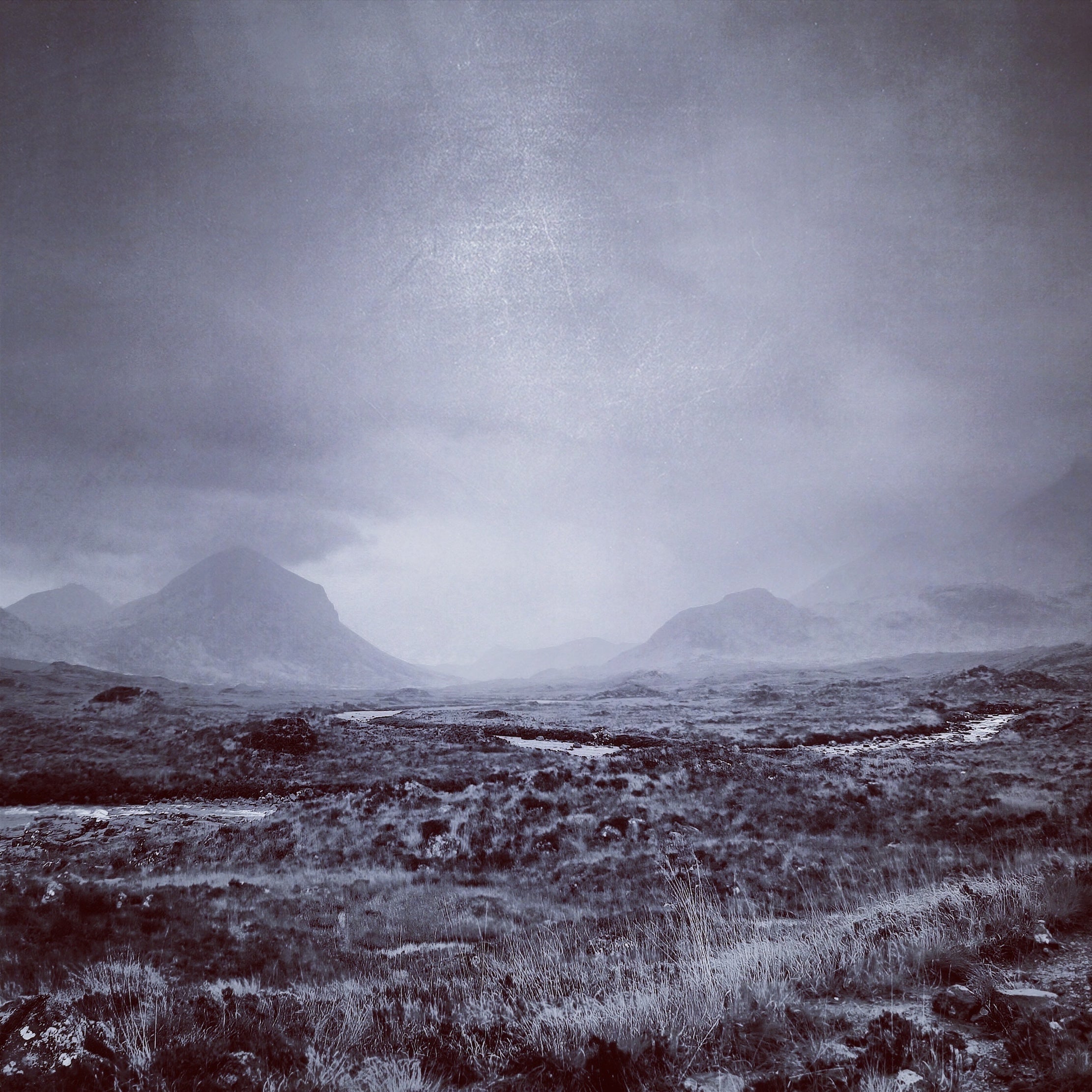 Misty desolate mountain landscape under stormy sky for The Brooding Cuillin wall art