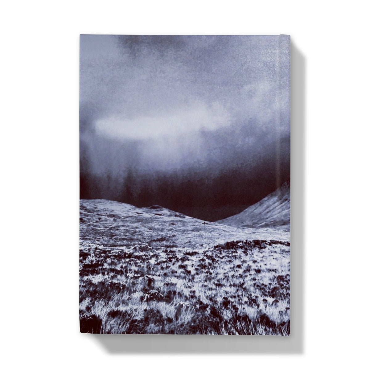 Dark gray and white textured mountain landscape with fog on journal
