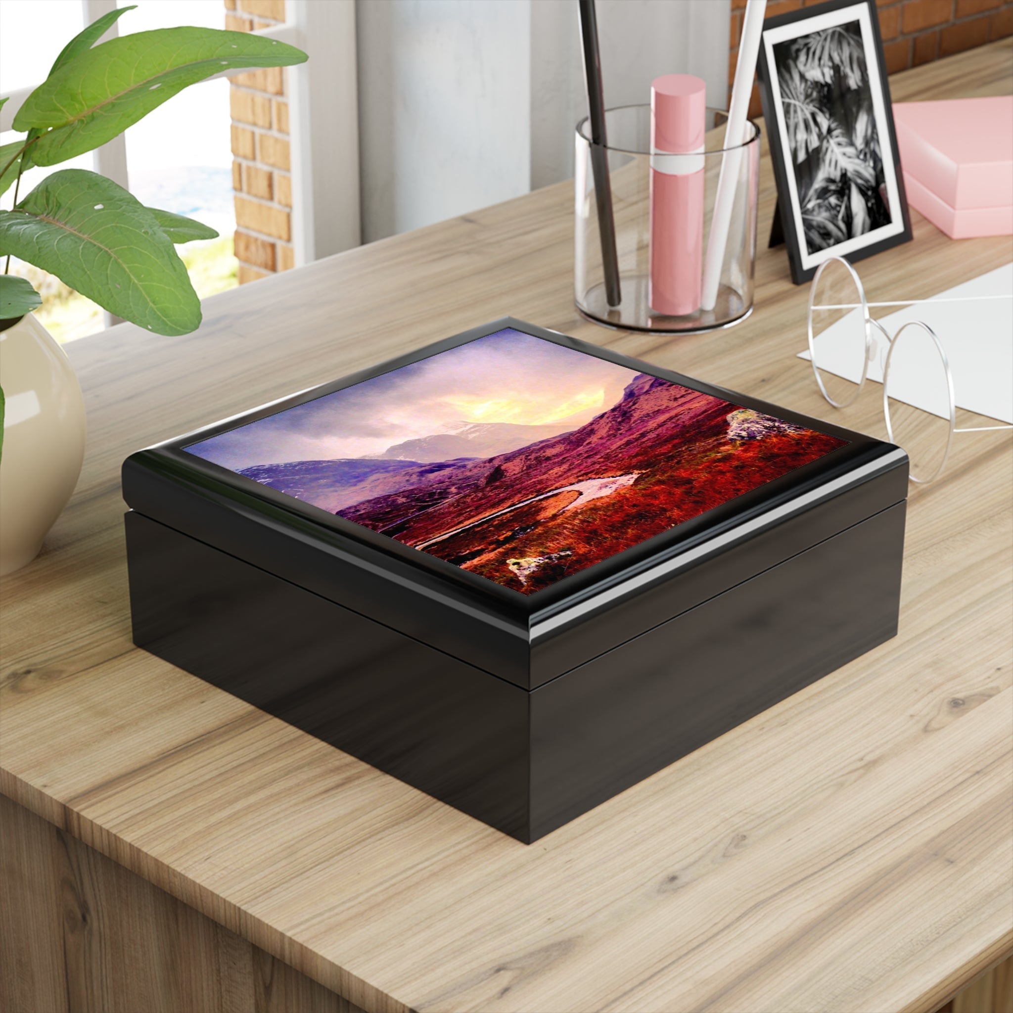 A Brooding Glencoe Jewellery Box with black leather and mountain lid