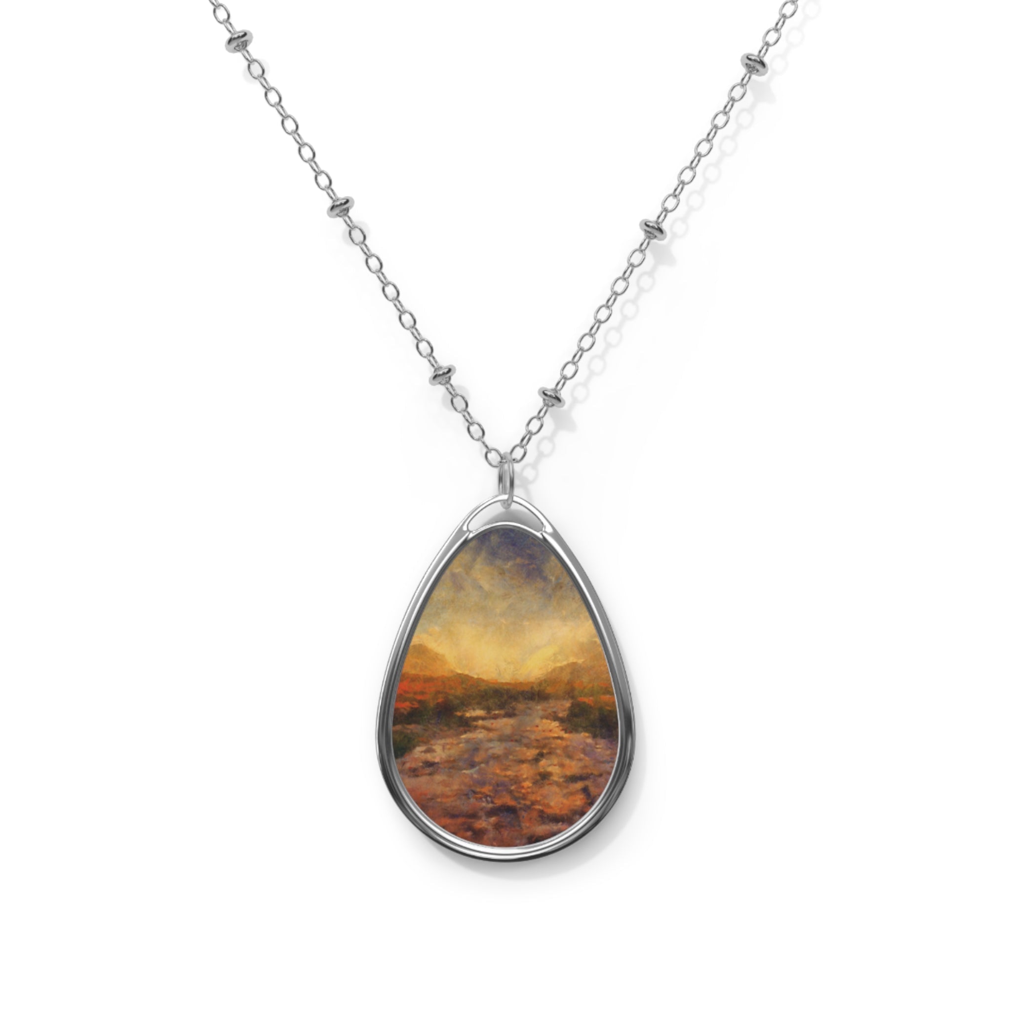 Silver chain necklace with oval pendant showcasing a painted Scottish landscape scene
