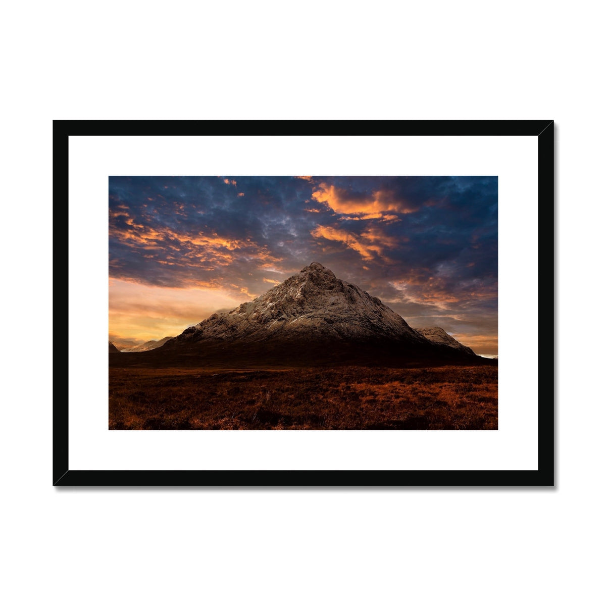 Black framed Buachaille Etive Mor dusk print with vibrant sunset and snow peak