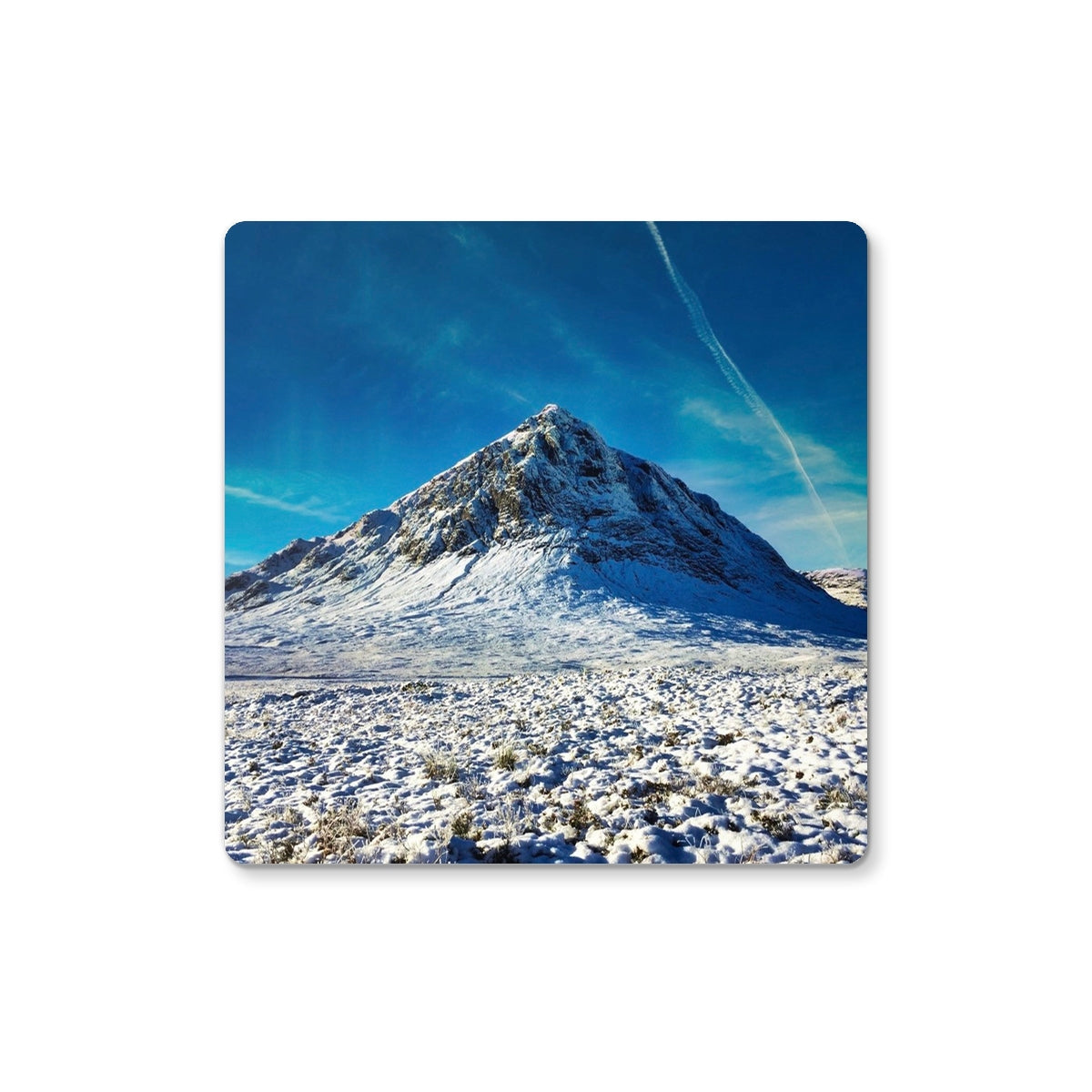 Snow-covered Buachaille Etive Mor mountain coaster with blue sky and clouds