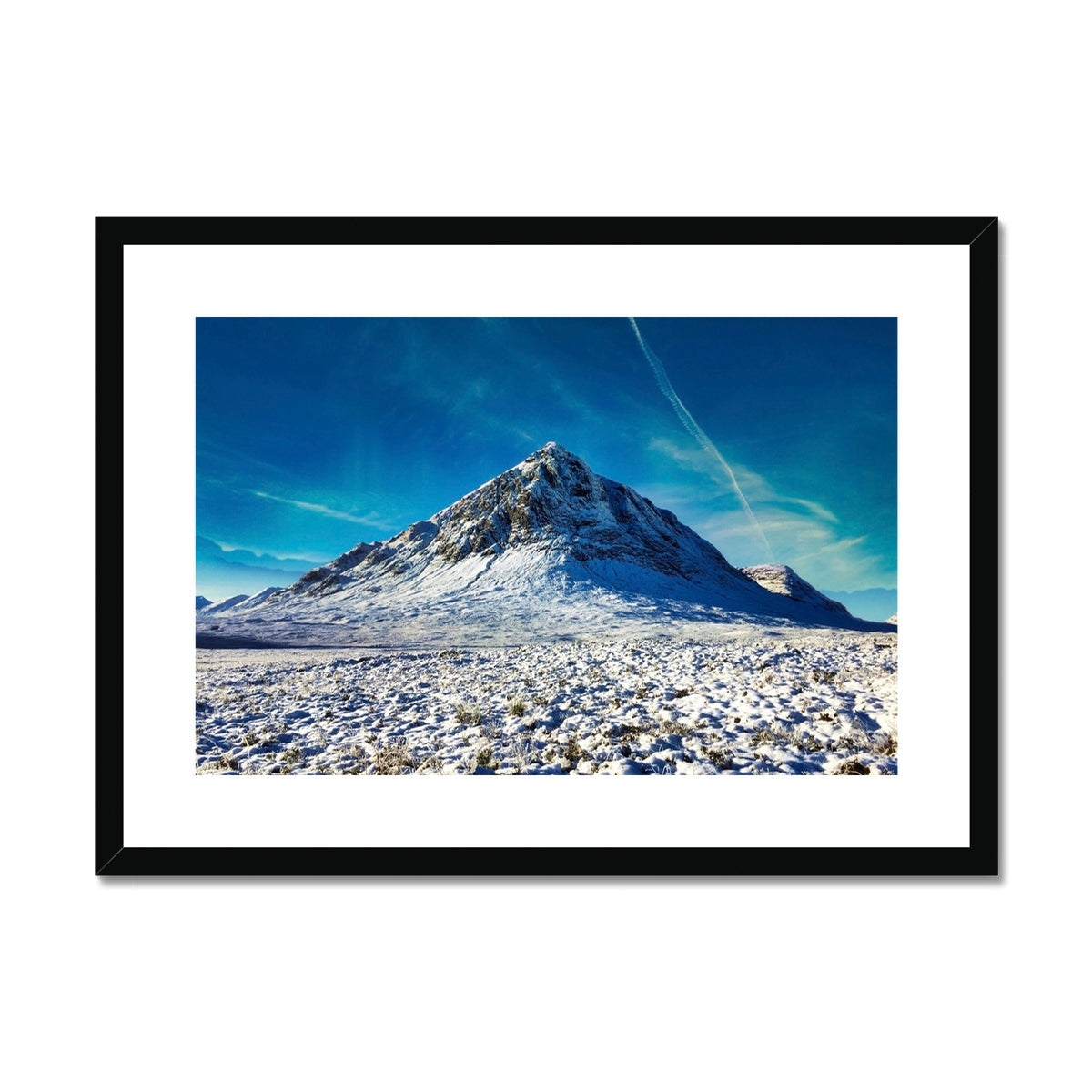 Black framed Buachaille Etive Mor winter print with snowy peak and blue sky
