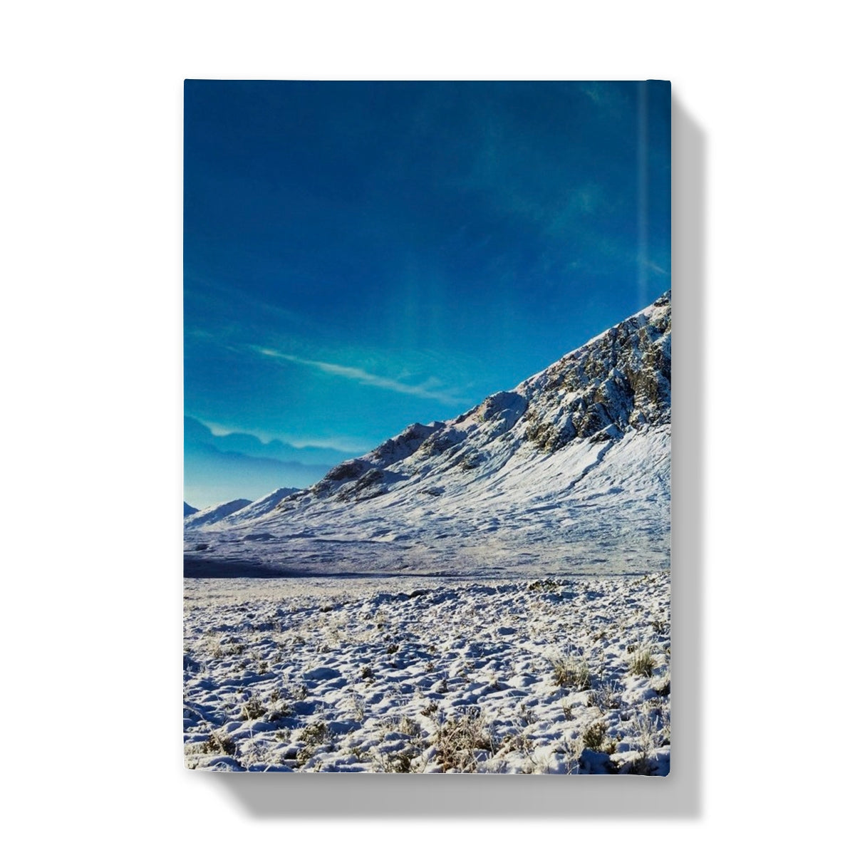 Canvas print of snowy Buachaille Etive Mor mountainscape in blue sky journal