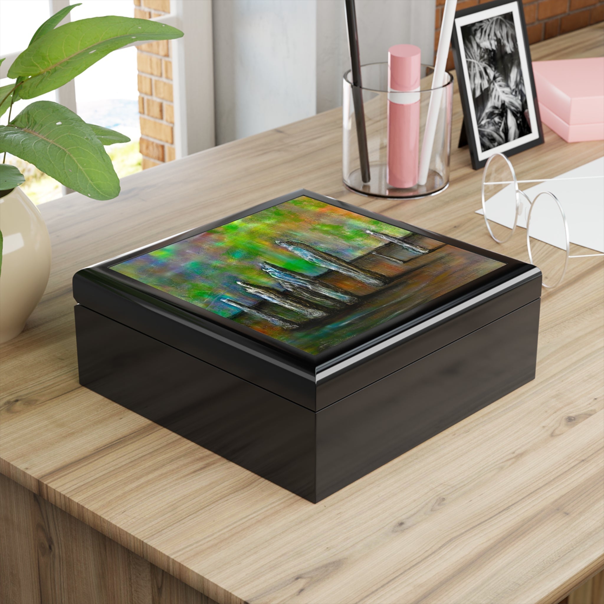 Black wooden jewelry box with colorful abstract art lid from Callanish Northern Lights collection