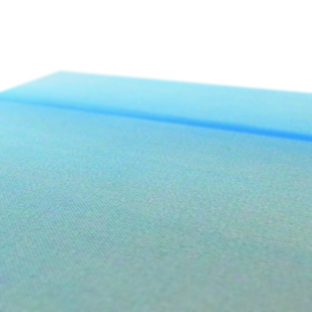 Calm Canvas soft light blue textured fabric with subtle gradient