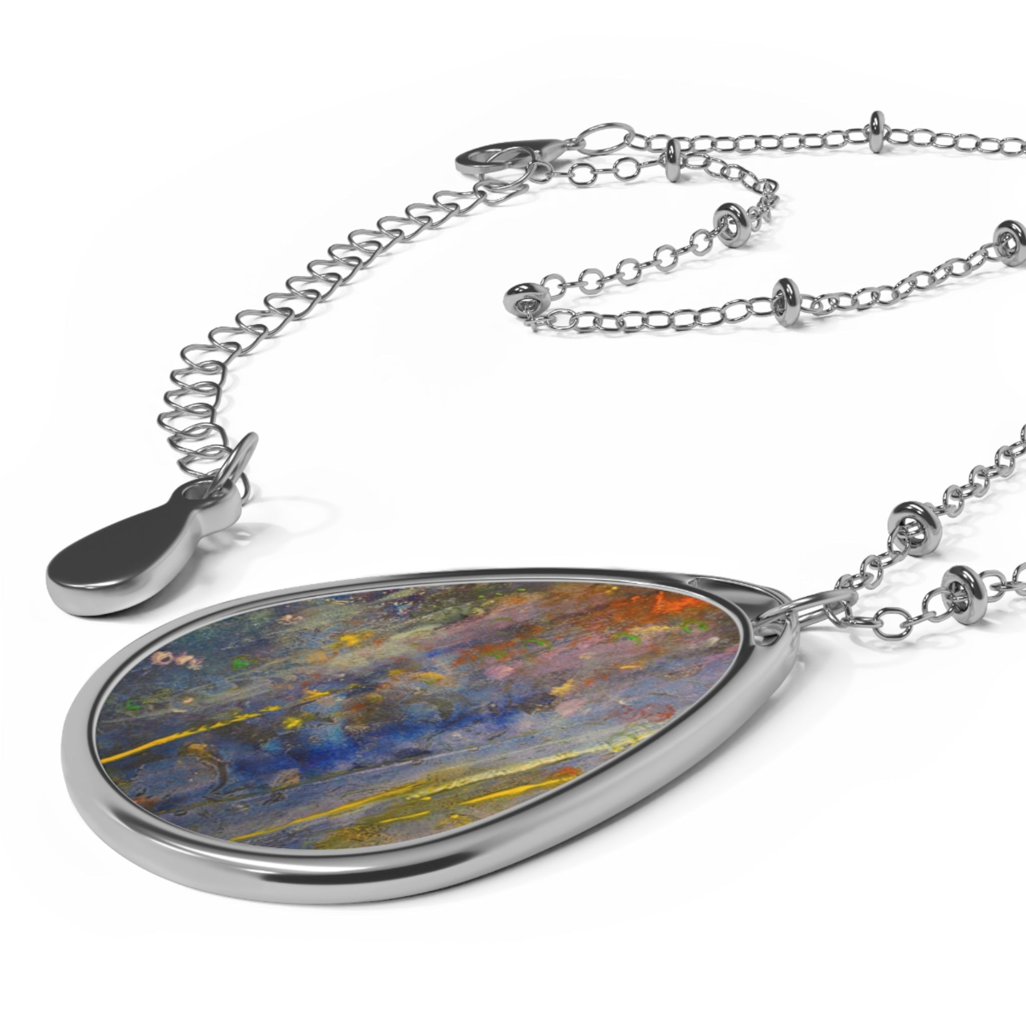 Silver-toned teardrop necklace with abstract colorful Scottish Art Jewellery design