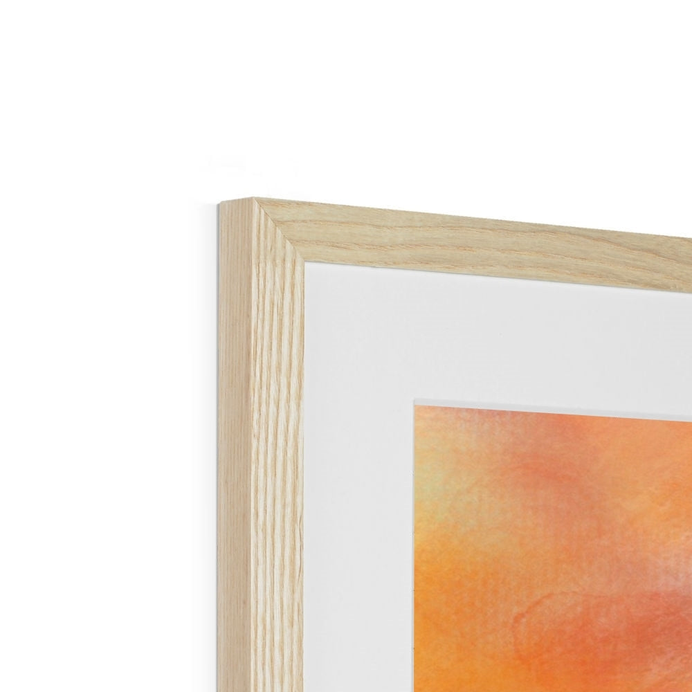 Light wood-framed Castle Stalker Sunset print with orange abstract art and white mat