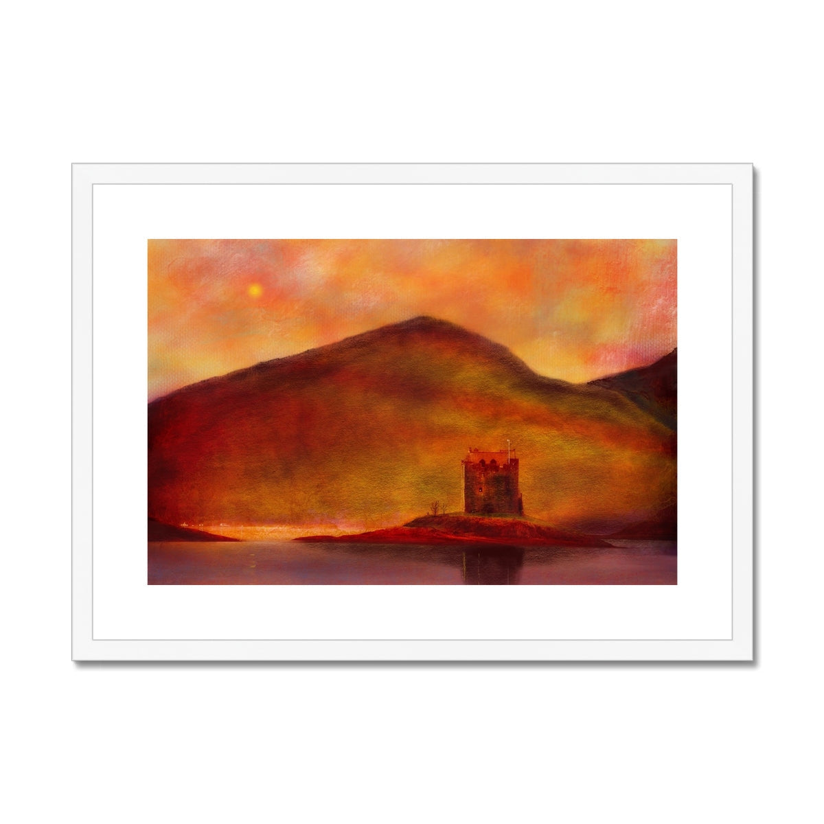 Framed landscape print depicting Castle Stalker, mountains, and sunset scene