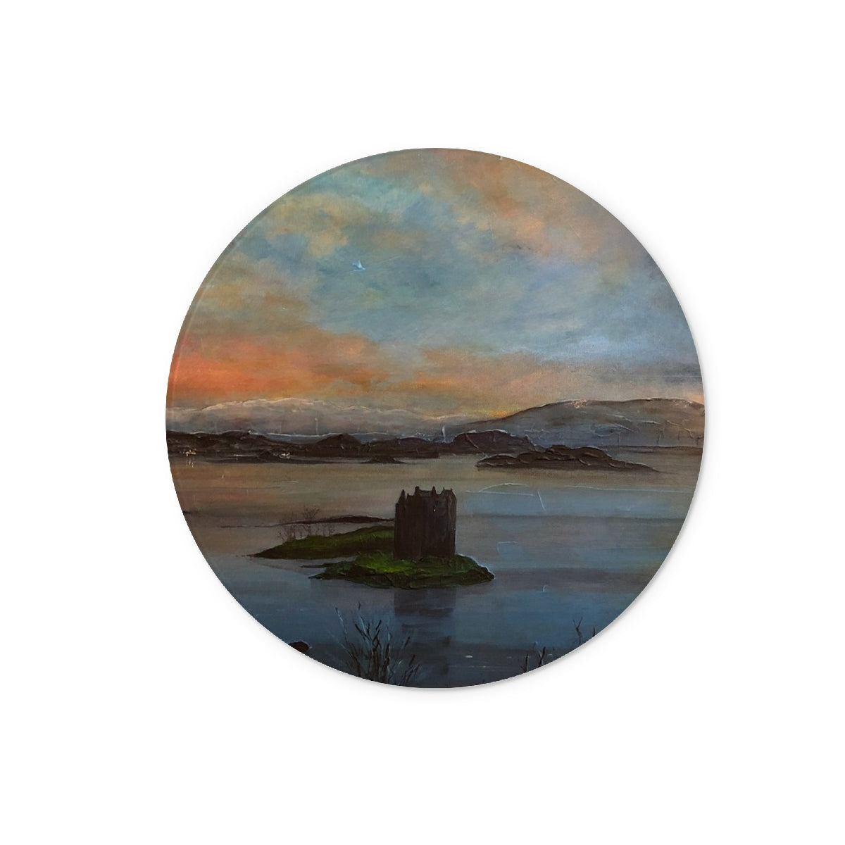 Round painting of a Scottish landscape with Castle Stalker on an island on a Twilight Glass Chopping Board