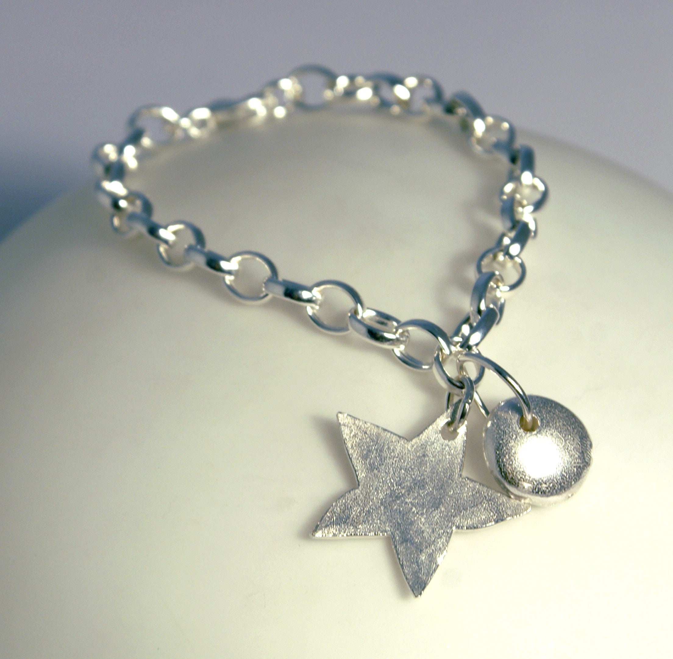 Star & Nugget Bracelet with silver star disc charms and matte texture