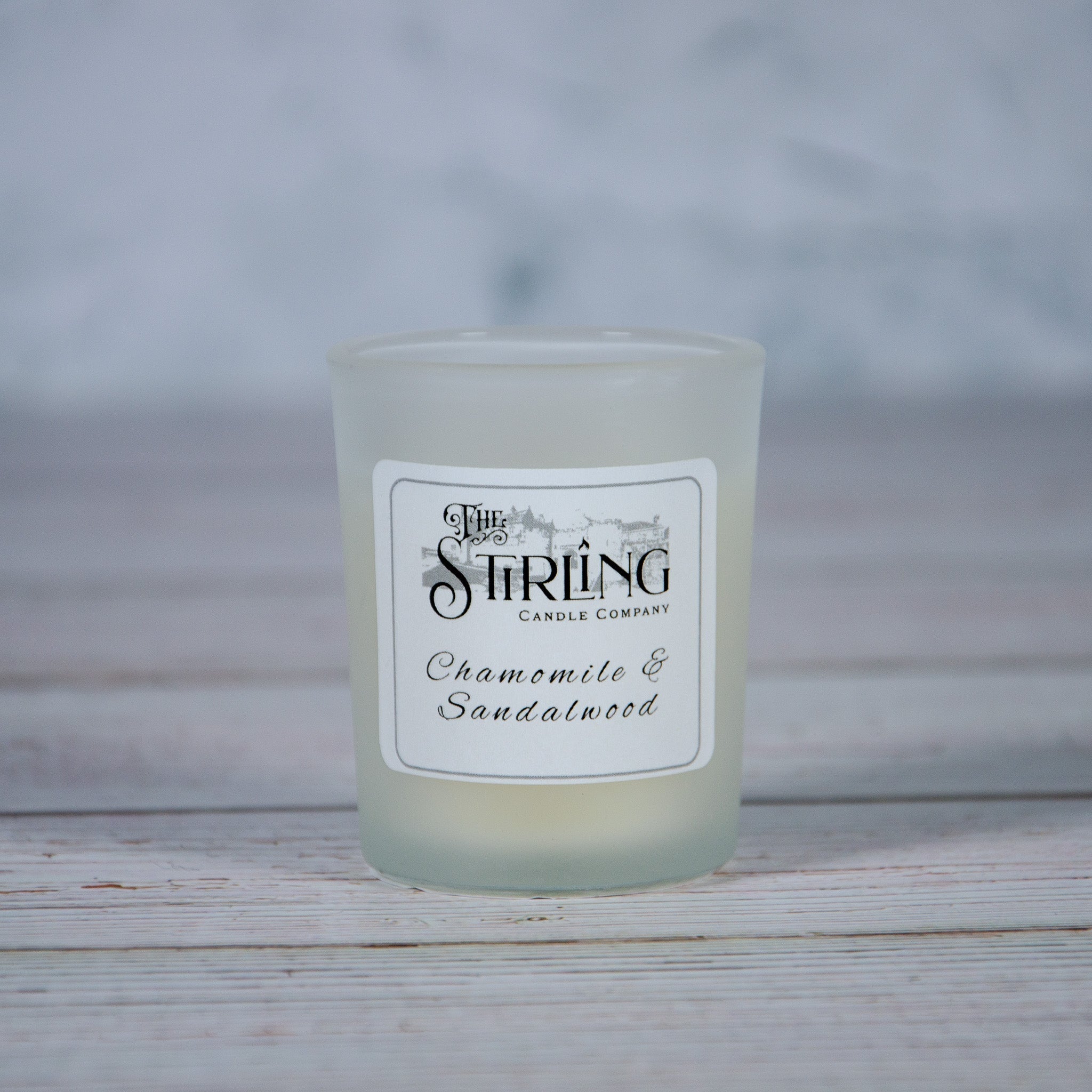 Chamomile & Sandalwood small candle in frosted glass jar with The String Candle Company label
